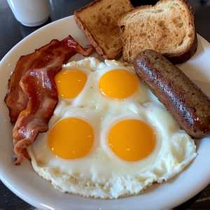 3 Eggs With Choice Of Ham, Bacon Or Sausages